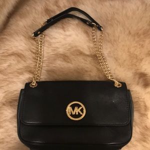 Black MK handbag.
